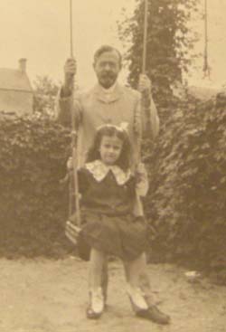 W. H. G. T. pushing Winifred in a swing. Click for enlarged image.