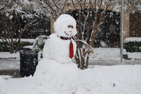 Image of snowman outside library Feb 2010
