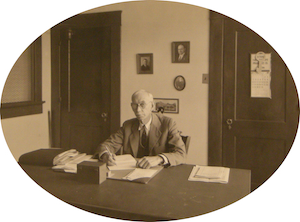 R. T. Chafer at his desk. Click for enlarged image.